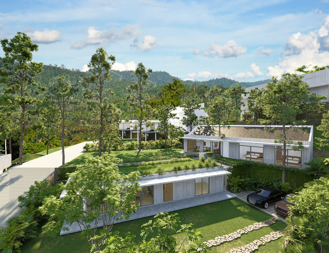 Aerial view of a villa's planted roofs and gardens, with the Victoria Reservoir and hills beyond